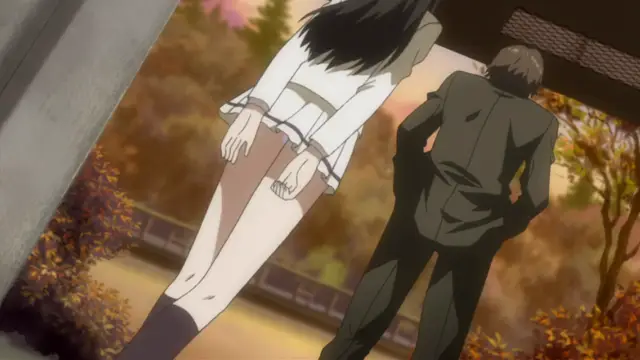 A black-haired girl in a school uniform is shown slumped over and unconscious, leaning against a building next to a man in a dark suit who is standing with his head bowed. Screenshot from Kara no Shoujo - Episode 2