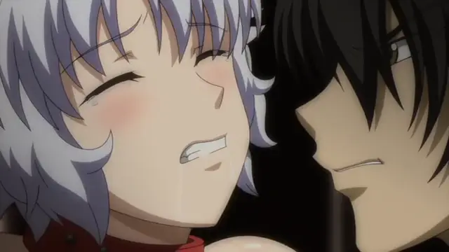 A girl with light purple hair and blushing cheeks has her eyes closed and mouth slightly open as she stands close to a black-haired man with a serious expression. Screenshot from Yabai! Fukushuu Yami Site - Episode 2