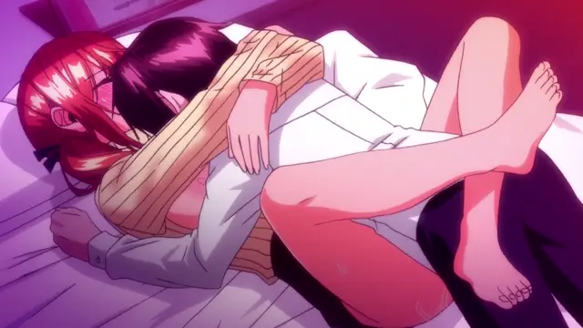 A girl with long red hair and a girl with long black hair lie on a bed in an embrace, with the black-haired girl wearing a striped sweater and wrapping her legs around the other. Screenshot from Girl's Rush - Episode 1