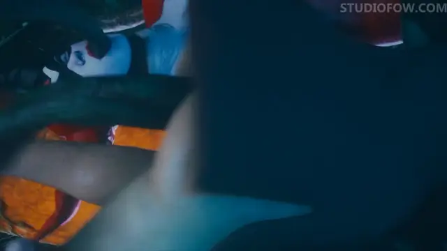 A close-up shot of a woman in a red dress being penetrated from behind by a man while her face is pressed against a surface. Screenshot from Tentacle Trouble