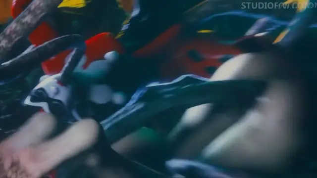 A blurry close-up shot from a studiofw.com production shows a character with white hair and black markings lying on a red surface while being embraced or held by another figure. Screenshot from Tentacle Trouble