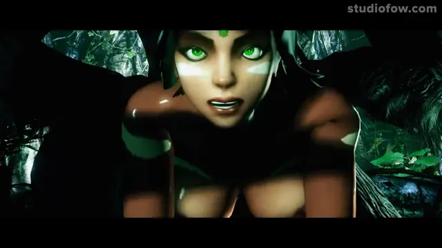 A high-angle, close-up shot shows an elf-like woman with green eyes and white face markings leaning forward with a surprised expression in a dark forest setting. Screenshot from The Circle Of Life