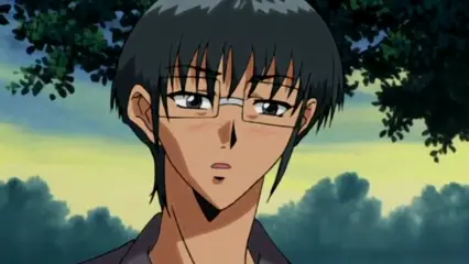 A startled male character with black hair and glasses reacts with a flushed face while outdoors. Screenshot from Hana Dorei - Episode 1