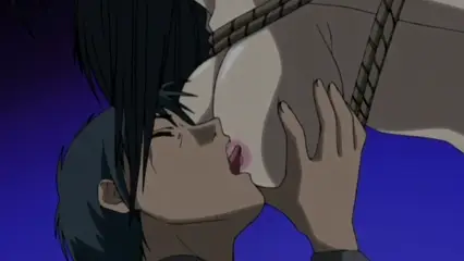 A young man with dark hair looks up and kisses the large breast of a woman who is tied up with rope, with subtitles displaying "So big..." above the scene. Screenshot from Hana Dorei - Episode 1