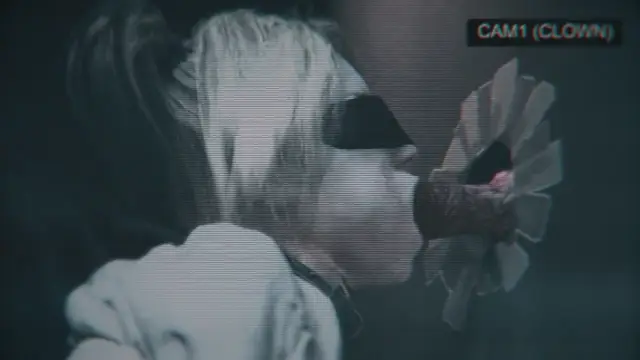 A blonde anime girl wearing a ruffled clown collar is shown in a grainy, security camera-style shot with the text "CAM1 (CLOWN)" in the top right corner. Screenshot from Scarlet Nights