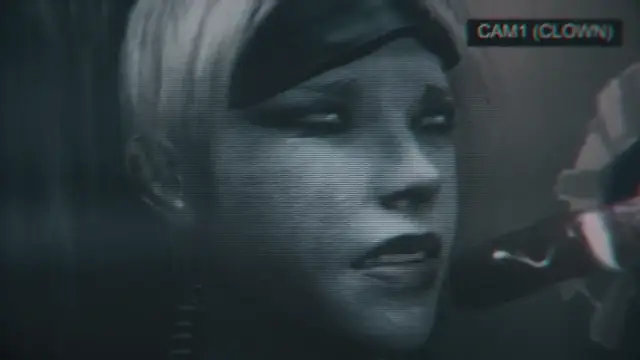 A close-up, grainy security camera shot shows a woman with blonde hair and a black headband looking off-camera with a dazed expression, with the text "CAM1 (CLOWN)" in the upper right corner. Screenshot from Scarlet Nights