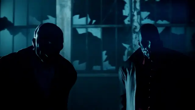 Two men in dark suits stand in a dimly lit, derelict room with shattered windows, looking towards each other with serious expressions. Screenshot from Scarlet Nights