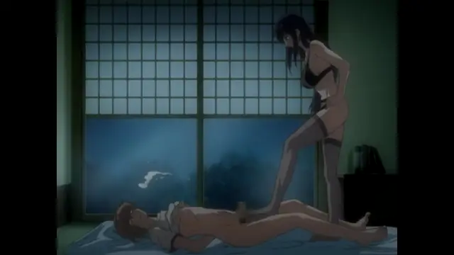 A woman in black lingerie stands over a man lying on a bed, while a large penis is shown between his legs in this scene from a Japanese anime. Screenshot from Nee Chanto Shiyou Yo! - Episode 1