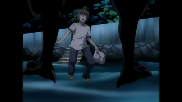 A terrified young man with short brown hair stands in a dark courtyard between two large, towering shadows while holding a plastic bag. Screenshot from Nee Chanto Shiyou Yo! - Episode 1