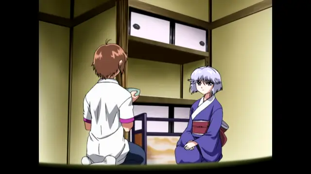A man in a white yukata and a woman in a purple kimono sit on the floor of a traditional Japanese room, facing each other across a low table. Screenshot from Nee Chanto Shiyou Yo! - Episode 2