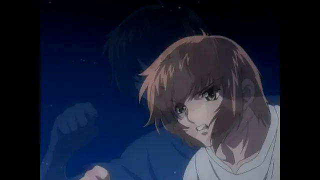 A girl with short brown hair and a shocked expression stands in front of a man with dark hair who has his arm raised. Screenshot from Nee Chanto Shiyou Yo! - Episode 4