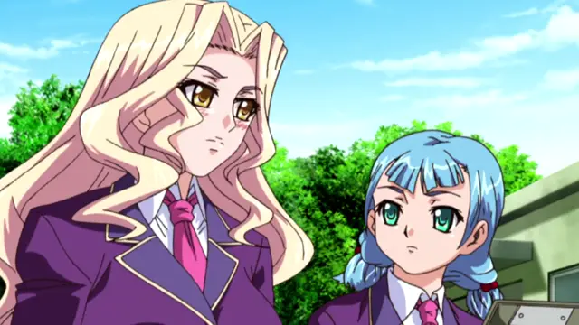 A blonde woman with long wavy hair and a blue-haired girl with pigtails stand side by side in school uniforms against an outdoor background. Screenshot from Saimin Ryoujoku Gakuen - Episode 3