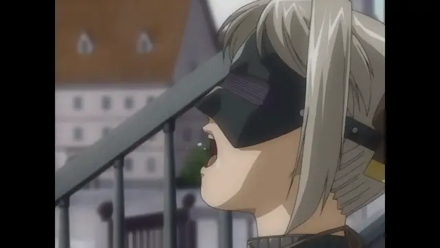 A close-up of a girl with blonde hair and a black mask over her eyes, looking to the left with her mouth open in a shocked expression. Screenshot from Himekishi Lilia - Episode 1