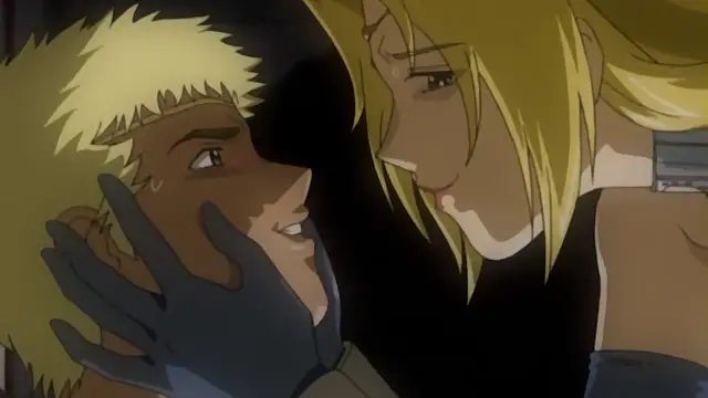 A close-up shot shows a blonde woman with an intense gaze gripping the face of a man with spiky blonde hair, who is smiling as she leans in toward him. Screenshot from Himekishi Lilia - Episode 5