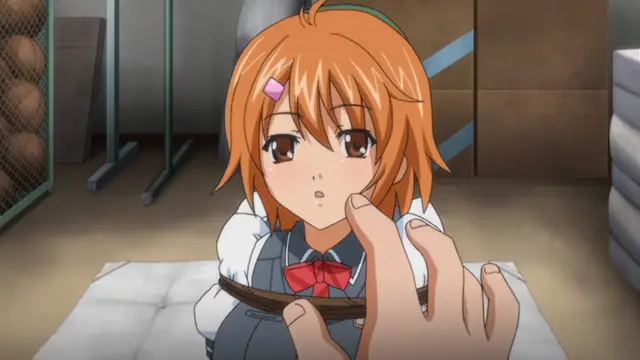 A girl with short orange hair and a school uniform sits on a futon in a room while a large hand reaches out to touch her chin. Screenshot from Kansen Inyoku no Rensa - Episode 1