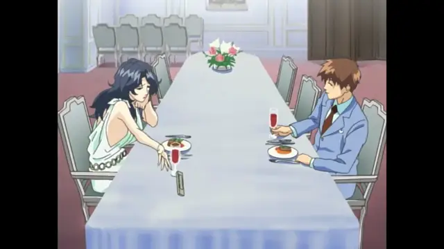 A long-haired woman in a white dress and a brown-haired man in a blue suit sit at a long dining table with plates of food and glasses of red wine. Screenshot from Foxy Nudes - Episode 2