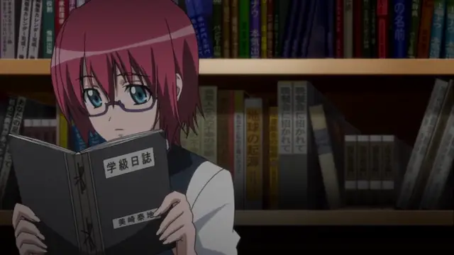 A girl with short pink hair and glasses stands in a library, looking down at a book titled "学級日誌" (Class Diary) while holding it with both hands. Screenshot from Wana Hakudaku Mamire no Houkago - Episode 2