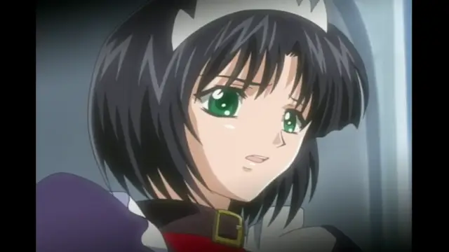 An anime girl with black hair and green eyes, wearing a tiara and a purple and red outfit, looks forward with a slight blush on her face. Screenshot from Elfina: Yoru e to Urareta Oukoku de... - Episode 2