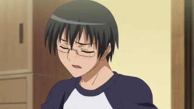 A blushing anime man with black hair and glasses looks down with a nervous expression, wearing a navy and white long-sleeved shirt. Screenshot from Triple Ecchi - Episode 2