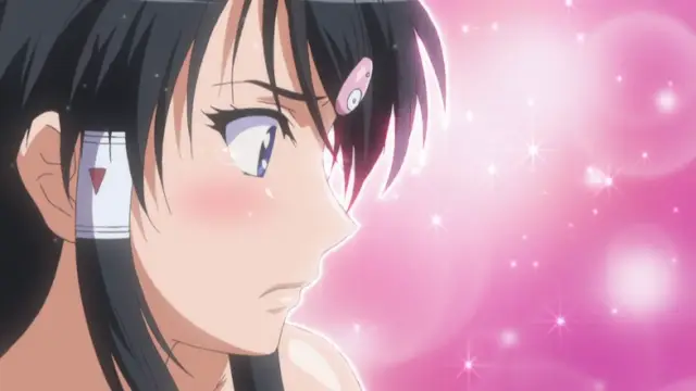 A blush-faced anime girl with black hair and blue eyes looks forward against a shimmering pink background. Screenshot from Triple Ecchi - Episode 4