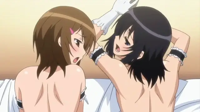 Two anime girls with short hair sit on a bed with their backs to the viewer, looking at each other with blushing faces and surprised expressions while holding white pillows. Screenshot from Joshikousei no Koshitsuki - Episode 5