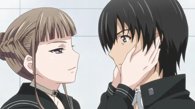 A girl with light brown hair in a choker and a black school uniform presses her hands against the face of a black-haired boy in a black school uniform as they look at each other in a school hallway. Screenshot from Euphoria - Episode 1
