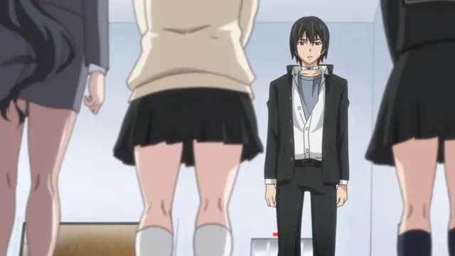 A black-haired male student in a school uniform stands between three girls in school uniforms with their backs turned toward him. Screenshot from Euphoria - Episode 1