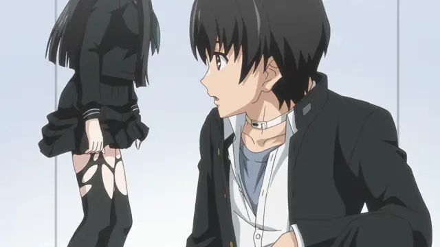 A high school boy with a choker and a girl with torn stockings stand facing each other in a minimalist room. Screenshot from Euphoria - Episode 3