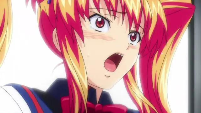 An anime girl with long pink and yellow hair and cat ears looks shocked with her mouth open and a blushing face. Screenshot from Inshitsu Otaku ni Ikareru Kanojo - Episode 2