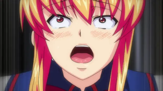 A shocked anime girl with long blonde and red hair, blushing cheeks, and a wide-open mouth looks forward with wide eyes. Screenshot from Inshitsu Otaku ni Ikareru Kanojo - Episode 2