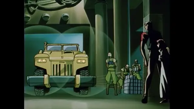 A large, vintage-style truck is positioned inside a dark hangar, while several people stand nearby, including a woman in a black dress and a man in a red and black bodysuit. Screenshot from Imma Youjo: The Erotic Temptress - Episode 1
