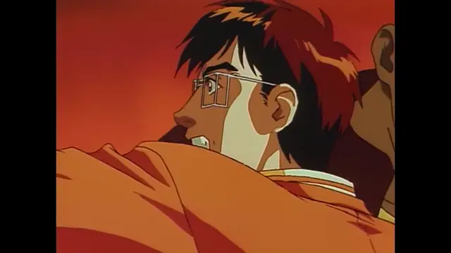 A close-up shot of a young man with glasses and reddish hair looking shocked or overwhelmed as he is being held from behind by another man in an anime scene. Screenshot from Imma Youjo: The Erotic Temptress - Episode 2