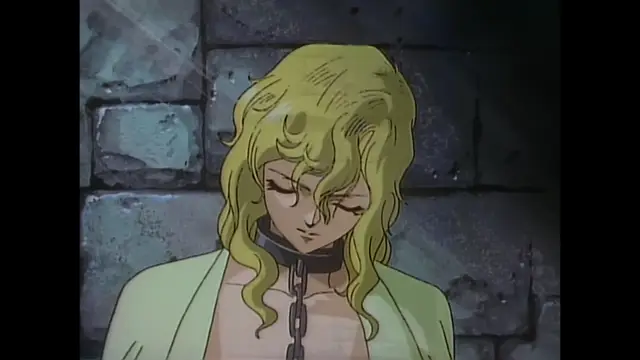 A blonde woman with a collar and chain around her neck looks down sadly with closed eyes in a dungeon setting. Screenshot from Imma Youjo: The Erotic Temptress - Episode 4