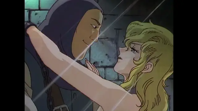 A blonde woman with long wavy hair and a shirtless man in a hooded cloak stand face-to-face in a dimly lit stone cell as rain falls on them. Screenshot from Imma Youjo: The Erotic Temptress - Episode 4