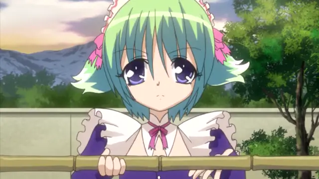 An anime girl with green hair and purple eyes wearing a ruffled white and purple dress stands behind a bamboo fence looking forward. Screenshot from Oshiete Re Maid - Episode 1
