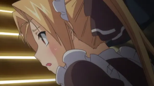 A blushing anime girl with light brown hair and a ruffled collar looks shocked and embarrassed while pressed against a wall or surface. Screenshot from Menkui! - Episode 1