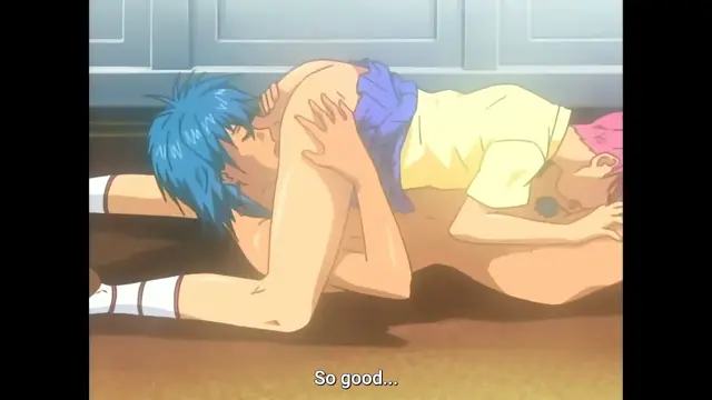 A blue-haired man in athletic shorts lies on his side on a brown floor, facing a woman in a yellow top who is lying on her stomach with her legs kicked up and her hand on his chest as she says, "So good...". Screenshot from Slave Nurses - Episode 3
