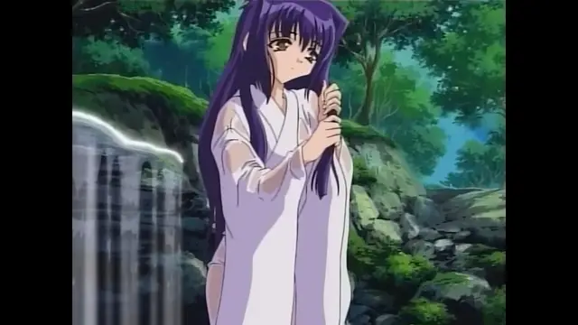 A girl with long purple hair and a white robe stands in front of a waterfall in a forest. Screenshot from Moonlight Lady - Episode 4