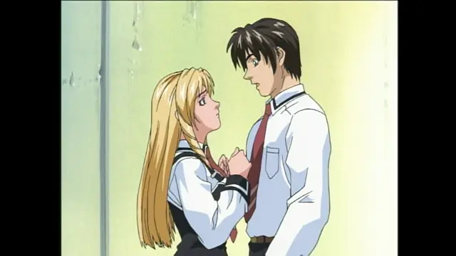 A blonde girl in a school uniform looks up at a brown-haired boy in a white shirt and red tie with a blushing expression as they stand close together in a dimly lit room. Screenshot from Bible Black - Episode 1