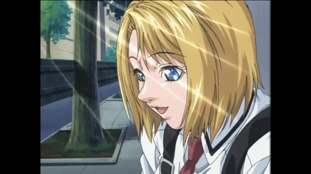 A blonde-haired girl in a school uniform looks down with a blushing, smiling expression while standing on a sidewalk next to a tree. Screenshot from Bible Black Origins - Episode 1