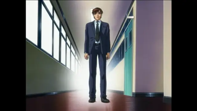 A brown-haired man in a navy blue suit stands in a brightly lit hallway, looking forward with a neutral expression. Screenshot from Bible Black New Testament - Episode 1
