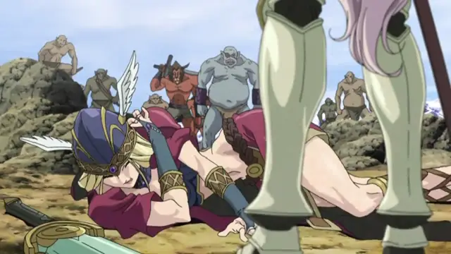 A female character in a red tunic and helmet lies defeated on the ground, surrounded by several muscular male warriors, while a tall figure in silver armor stands in the foreground. Screenshot from Ikusa Otome Suvia - Episode 1