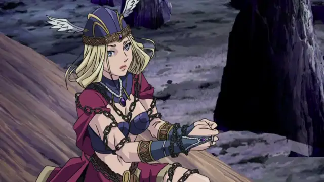 A blonde woman wearing a crown and red outfit is bound by chains and sits on the ground with a shocked expression. Screenshot from Ikusa Otome Suvia - Episode 1