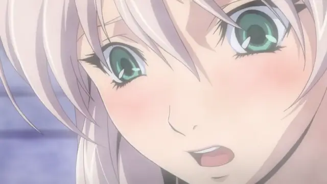 A close-up shot shows an anime girl with long silver hair and large green eyes, featuring a blushing face and an open mouth as she looks toward the camera. Screenshot from Ikusa Otome Suvia - Episode 2