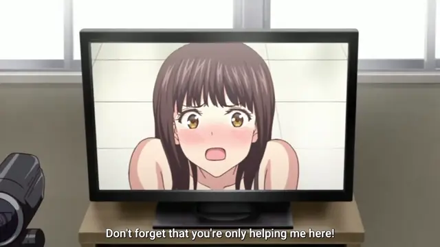 A brown-haired girl with a blushing face and open mouth looks forward on a computer screen with the subtitle "Don't forget that you're only helping me here!". Screenshot from Himitsu no Kichi - Episode 1