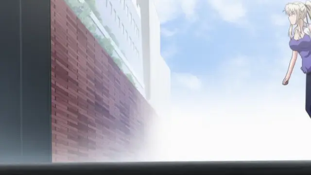 A blonde woman in a purple top stands looking toward a large brick wall on a sunny day. Screenshot from Shocking Pink! - Episode 2