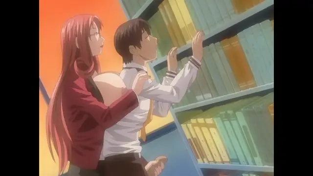 A long-haired woman in a red blazer stands behind a man in a white shirt as he reaches for a book on a library shelf. Screenshot from Cleavage - Episode 2