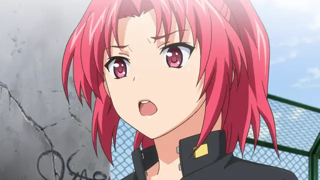 An anime girl with short pink hair and an angry expression stands in front of a cracked concrete wall and a chain-link fence. Screenshot from Wanna SpartanSex Spermax!!! - Episode 1