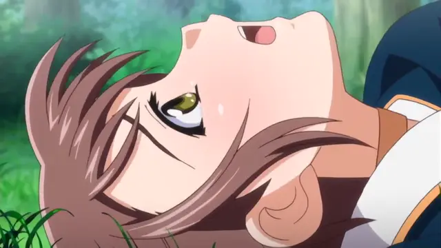An anime girl with long brown hair and golden eyes lies on the grass outdoors with her mouth open in a dazed, pleasure-filled expression. Screenshot from Diabolus Kikoku - Episode 2