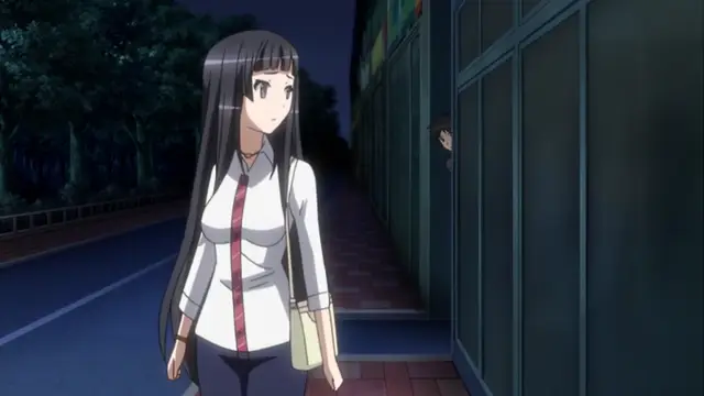 A long-haired schoolgirl in a white shirt and navy skirt walks along a sidewalk at night, unaware that a man is peeking at her from behind a glass building. Screenshot from Please Rape Me! - Episode 1